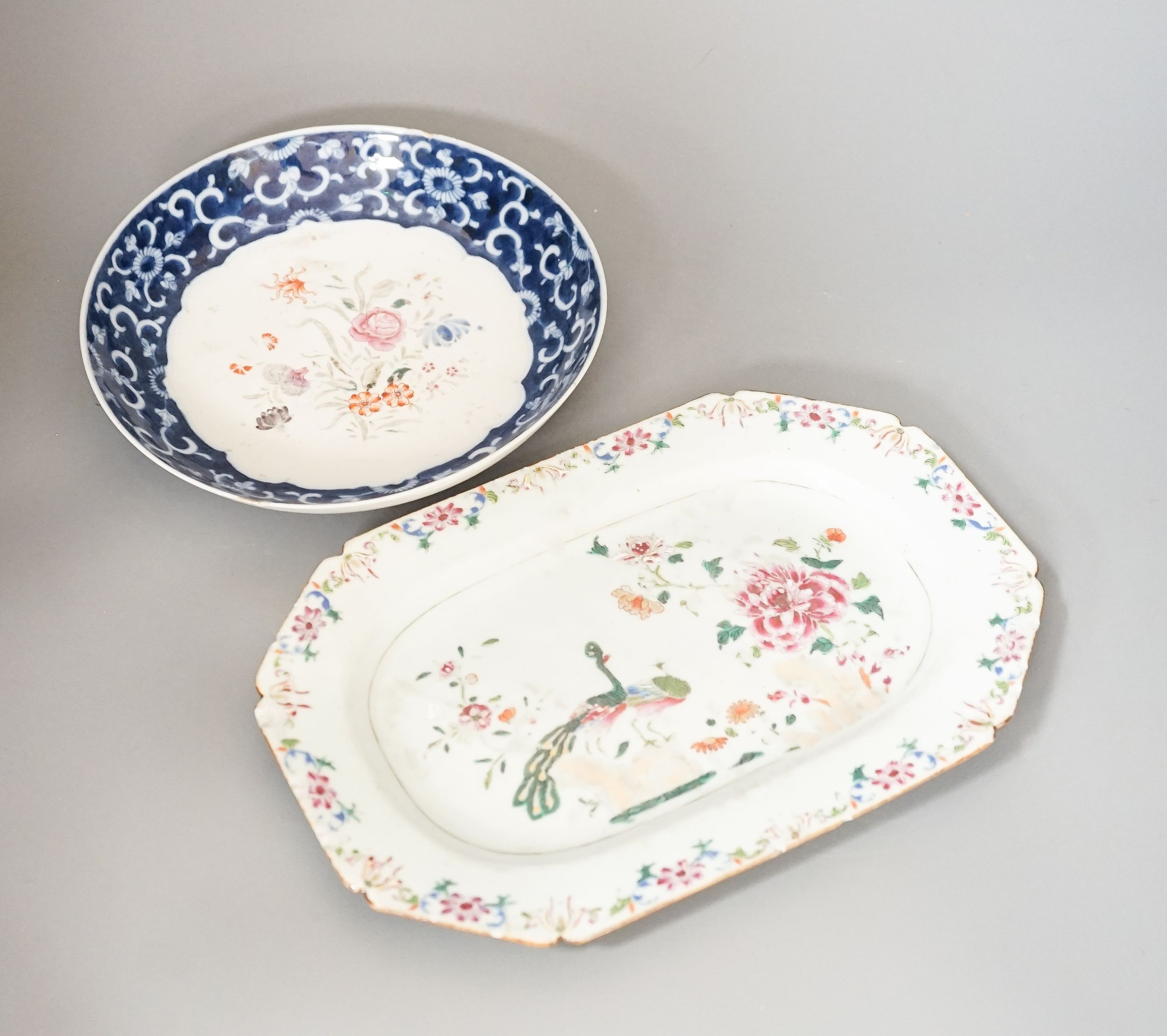A Chinese famille rose double peacock dish, Qianlong, 28 cm and a Chinese famille rose and underglaze blue saucer dish, Jiaqing